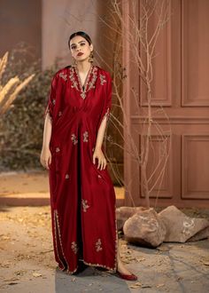 Wrap yourself in style with our Red Rawsilk Kaftan. It's a perfect blend of classic and modern, making you look effortlessly elegant. Elevate your fashion game with ease. Silk V-neck Party Sets, Elegant Satin V-neck Kimono, Elegant V-neck Kaftan For Festive Occasions, Elegant Festive Gown With Traditional Drape, Chic Silk Set For Festive Occasions, Elegant V-neck Party Kurta, Chic Dresses With Traditional Drape For Festive Occasions, Chic Floor-length Sets For Festive Occasions, Elegant V-neck Sets For Festive Occasion