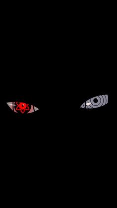 two eyes with red and blue lights in the dark