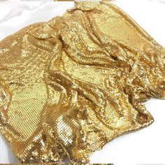 Aluminum Chainmail Fabric,Metal Mesh,Metallic Cloth Fabric,Loop Metallic Fabric,Gold Metallic Sequin Fabric Width:45cm Length/ Circumference:150cm Size of 1PC:45CMx150cm Size of 0.5PC:45CMx75CM Metallic Sequin Size: 3mm Feature: Aluminum Metallic Fabric 3mm Aluminum Sequins weave to the fabric  The Metal sequin mesh fabric is very suitable for a variety of clothes, such as jeans, Dress,Bra,Camisole,skirts, shorts, etc. it can also be used as a gift to your friends and family. Birthday Dress 21st, Metal Fabric, Unique Fabric, Applique Fabric, Dress Bra, Metallic Fabric, Chain Mail, Metal Mesh, Sequin Fabric