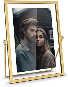 a gold frame with a photo of a man and woman