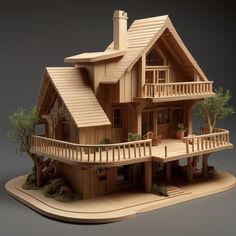 a wooden model of a house with balconys and balconies