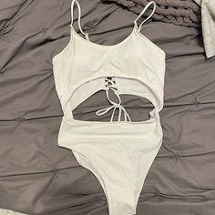 Nwt White Cutout Swimsuit With Cross Tie Detailing In The Back. Originally Purchased Off Of Amazon For My Bachelorette Party But Never Wore! Hygienic Liner Still On - Size Xl But Fits More Like A L. Amazon Sleeveless Swimwear For The Beach, Fitted Sleeveless Swimwear By Amazon, Amazon Spring Beach Swimwear, Amazon Stretch Swimwear For Summer, Peplum Swimsuit, Zipper Swimsuit, Strap Swimwear, Cutout Swimsuit, Bathing Suits One Piece