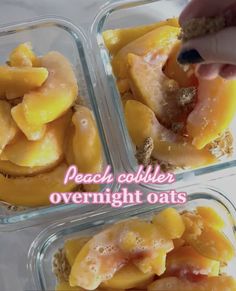 three glass containers filled with peach cobbles and overnight oats on a marble counter top