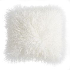 a white fluffy pillow on a white background