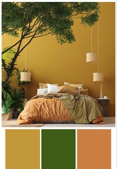 a bedroom with yellow walls and green trees on the wall, along with orange bedding