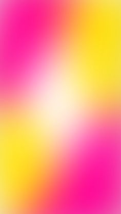 an abstract blurry background in pink and yellow