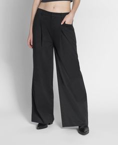 Crafted from 100% Supima cotton Introducing our new mid-rise wide leg pants, perfect for any occasion. With a flattering silhouette and comfortable fit, these pants are made with high-quality materials for durability and easy care. Elevate your fashion game with this stylish and practical addition to your wardrobe. -21 Luxury Dark Wash Mid-rise Wide Leg Pants, Black Stretch Mid-rise Wide Leg Pants, Black Wide Leg Pull-on Bottoms, Supima Cotton, Mid Rise, Cotton Weaving, Fashion Games, Wide Leg Pants, Wide Leg