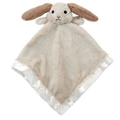 a baby blanket with a bunny on it's back and ears sticking out from the top