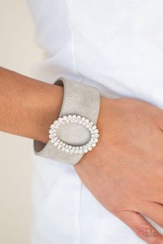 Encrusted in glassy white rhinestones, a round silver frame slides along a thick gray leather band for a glamorous look. Features an adjustable snap closure. Silver Wrap Bracelet, Rhinestone Slides, Glamorous Look, Turquoise Bead Bracelet, Jewelry Bracelets Silver, Paparazzi Accessories, Gray Leather, White Rhinestone, Paparazzi Jewelry