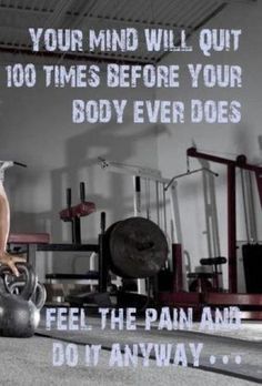 a woman doing squats with a kettle in front of her and an exercise poster behind her