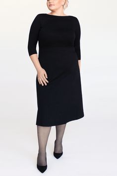 Fitted Knit Midi Dress For Work, Fitted Knit Dress In Solid Color, Fitted Knit Solid Color Dresses, Solid Knit Fitted Dresses, Black Knee-length Knit Midi Dress, Fitted Knee-length Knit Midi Dress, Fitted Knee-length Sweater Dress For Work, Knee-length Stretch Knit Midi Dress, Fall Midi Dress In Elastane