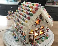 a gingerbread house made with candy and marshmallows