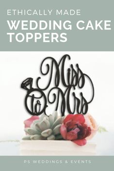 a wedding cake topper with the words mr and mrs on it, surrounded by succulents