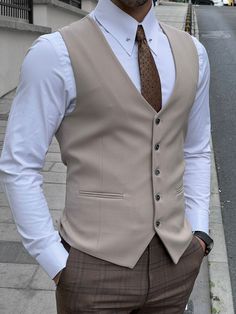 NEW COLLECTİON - FW / 23Collection: Fall / Winter - 23Production: Private Collection Slim-fit Wool Beige Men’s WaistcoatProduct color: BEİGEProduct material: %40 Wool , %30 Viscon , %25 Polyester , %5 ElestanProduct details: The waistcoat is adjustable from the back.Product care: Dry clean onlyProduct size: 48-50-52-54-56-58Package İncluded : Waistcoat Dimensions of the mannequin: 185cm / 78kg , Size : 50EU / 40US Beige Waistcoat Outfit, Mens Vest Outfits, Waistcoat Designs For Men, Outfit With Vest, Men Formal Outfit, Men Vest Outfits, Vest Outfits Men, Waistcoat Outfit