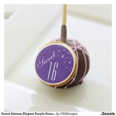 a blue and black cake pops with the word team blue on it's top