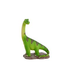 a green toy dinosaur sitting on top of a rock