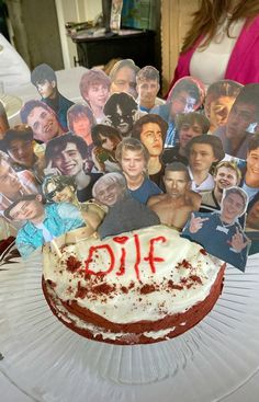 a cake that has been decorated with pictures of people on it and is sitting on a table