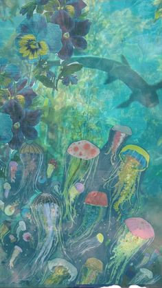 an underwater scene with jellyfish and other marine life