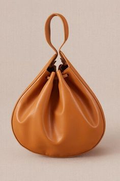 Tan brown crossbody bucket bag with corded handle detail. - Aza Fashions Travel Bucket Bag With Handle Drop, Versatile Bucket Shoulder Bag With Handle Drop, Bucket Shoulder Bag With Handle Drop For Errands, Versatile Hobo Bag With Detachable Handle And Bucket Shape, Daily Use Bucket Bag With Handle Drop, Versatile Bucket Bag Pouch, Chic Bucket Bag With Handle Drop, Daily Use Shoulder Bag With Bucket Shape, Daily Use Shoulder Bag With Handle Drop