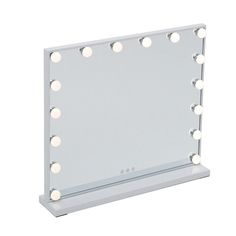 a white vanity mirror with lights on it