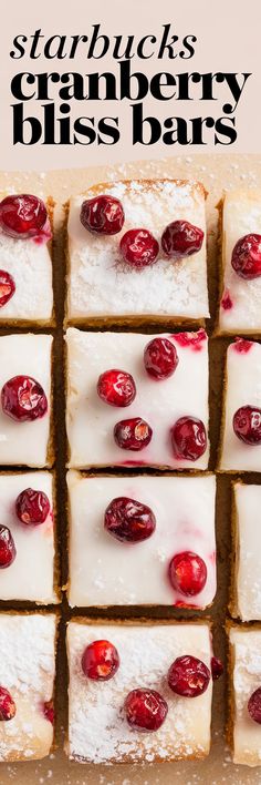 several squares of cranberry bliss bars with white frosting and cherries on top