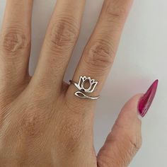 925 Sterling Silver Height: 11mm Finish: Rhodium Plated Can Be Worn: On Multiple Fingers And Midi Ring Symbolizes: Purity, Enlightenment, Self-Regeneration, Rebirth Lotus Flower Ring, Silver Leaf Ring, Lotus Ring, Silver Flower Ring, Diamond Ring Princess Cut, Dainty Band, Opal Band, Silver Diamond Ring, Ring Flower