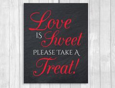 a sign that says love is sweet please take a treat