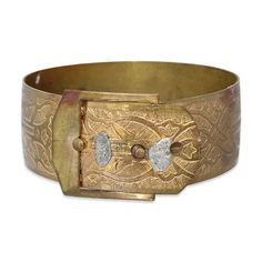 "Antique brass buckle bracelet. This wide bangle style bracelet features an intricately etched floral pattern and a functioning buckle that opens and closes with a peg and hole system. To double lock the closure, the original owner used a hardware screw for reinforcement. Although the screw isn't necessary to close the bracelet, I've included the screw to honor its original estate-found condition--and it looks very cool. The interior is signed \"Bess\" in the old hand-engraved style, a warm remi Double Lock, Buckle Bracelet, Bangles Style, Bracelet Vintage, Brass Buckle, Early 1900s, Hand Engraving, Estate Jewelry, Womens Jewelry Bracelets