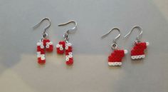 three pairs of red and white beaded earrings with santa's hat on them