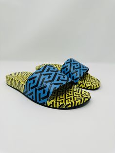 Product Details * TPU upper * Open toe * Slip-on * Polyurethane footbed * TPU Sole * Made in Italy All merchandise is 100% Authentic. Yellow Non-slip Slides With Round Toe, Yellow Non-slip Round Toe Slides, Yellow Non-slip Open Toe Slippers, Yellow Slip-on Slippers For Summer, Yellow Non-slip Slides, Yellow Non-slip Slide Flip Flops, Designer Synthetic Slides Slip-on, Designer Synthetic Slip-on Slides, Casual Yellow Slippers With Rubber Sole