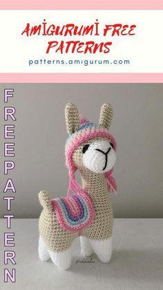 a crocheted llama with a pink hat and scarf