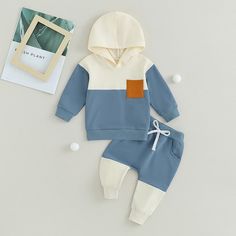 This set is a step above ordinary baby wear. Your little one can rock even the chillest and most relaxed days in style & ease thanks to the hoodie and sweatpants modern chic design. Playful Cotton Hoodie For Playtime, Playful Blue Hoodie For Fall, Casual Cotton Hoodie For Playwear, Blue Cotton Hoodie For Playtime, White Cotton Hoodie For Playtime, White Cotton Hoodie For Casual Wear, Two Tone Hoodie, Hoody Outfits, 2 Piece Outfit Set