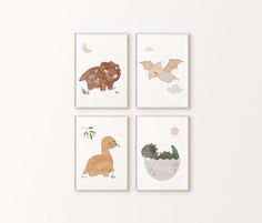 four prints with animals on them in different shapes and sizes, hanging on a wall