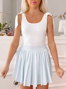 Brynn White Bow Bodysuit | Sassy Shortcake | sassyshortcake.com Cute Bodysuit For Summer, Cute Solid Color Summer Bodysuit, Cute Solid Color Bodysuit For Summer, Cute Fitted Solid Color Bodysuit, Cute Fitted Bodysuit, Cute White Stretch Bodysuit, Blue Tennis Skirt Outfit, Blue Tennis Skirt, Sassy Shortcake