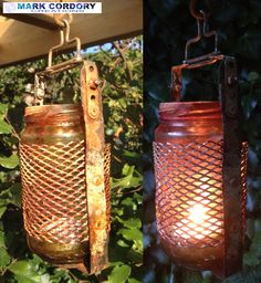 an old fashioned lantern hanging from a tree next to a light fixture on a chain