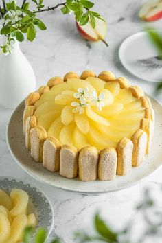 there is a cake with pineapple topping on the table