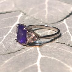 Sterling Silver 925, Size 5.5 Elegant Purple Crystal Ring With Prong Setting, Emerald Cut Birthstone Ring With Accent Stones, Fine Jewelry Amethyst Ring With Vs Clarity, Elegant Amethyst Crystal Ring With Gemstone Accents, Elegant Amethyst Crystal Ring With Accent Stones, Elegant Purple Crystal Ring With Accent Stones, Elegant Lavender Crystal Ring, Classic Amethyst Birthstone Ring In White Gold, Elegant Purple Sapphire Ring With Gemstone Accents