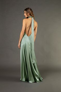 Pure silk charmeuse backless halter gown cut on the bias. Featuring a low open back and long ties at neck that can be double knotted or tied in a bow. Fully lined in silk. Made in USA. *Special orders in custom colors are also available. Please email us at shop@michellemason.com for further inquiries. Composition: 100% silk Silk Backless Dress, Anniversary Outfit, Backless Gown, Halter Gown, Silk Gown, Silk Charmeuse, Halterneck Dress, New Arrival Dress, Knit Skirt