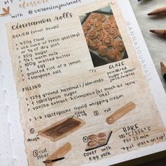 the recipe book is open to show instructions for cinnamon rolls and other baked goods on it