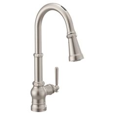 a kitchen faucet with the pull out sprayer and chrome finish, on a white