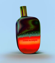 a red and green bottle sitting on top of a blue surface with the words etappeco printed on it