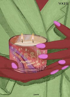 a hand holding a lit candle with the words libra on it in front of green leaves