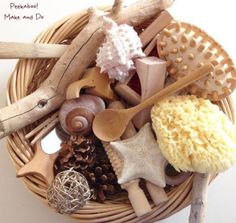 a wicker basket filled with different types of seashells and starfishes