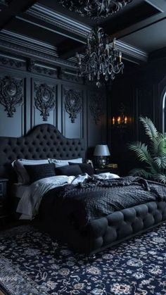 a large bed sitting in the middle of a bedroom next to a chandelier