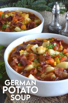 two bowls of german potato soup on a table