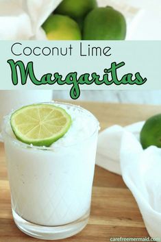 coconut lime margarita in a glass on a cutting board