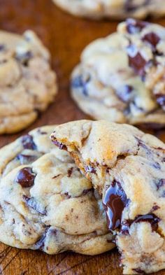 chocolate chip cookies are stacked on top of each other