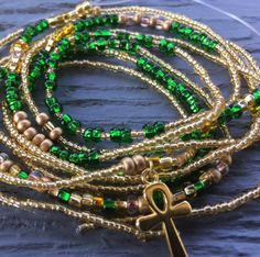 Excited to share this item from my #etsy shop: Green and Gold Waist Bead Combo #jewelry #gold #women #bellychains #waistbeads Handmade Adjustable Waist Beads For Gift, Festival Gold Bracelets With Beaded Chain, Gold Round Waist Beads For Gifts, Adjustable Spiritual Waist Beads With Beaded Chain, Adjustable Spiritual Beaded Waist Beads, Adjustable Gold Waist Beads With Spacer Beads, Adjustable Gold Waist Beads, Adjustable Gold Jewelry With Colorful Beads, Gold Waist Beads With Beaded Chain As Gift