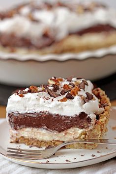 a piece of pie on a plate with a fork