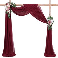 an arch decorated with flowers and greenery for a wedding ceremony or special occasion, isolated against a white background